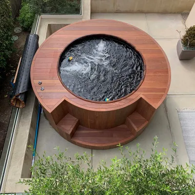 Hot tub wrapped with South Pacific Redwood Manilkara Torem 1200 1