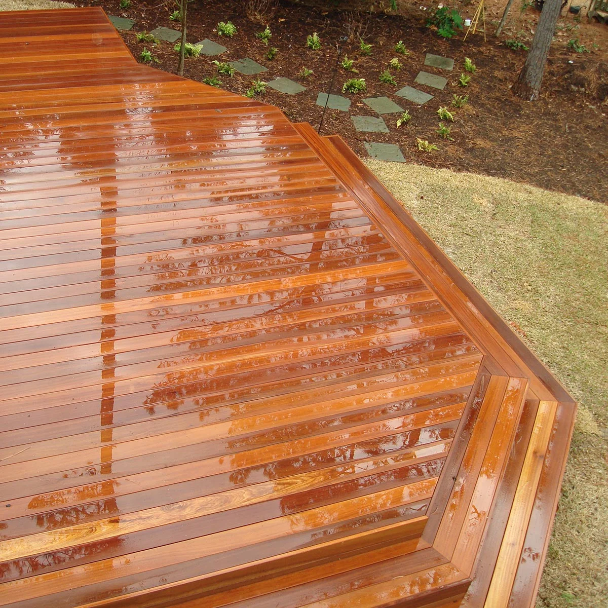 Bangkirai, Yellow Balau Deck After Rainstorm With Rocks