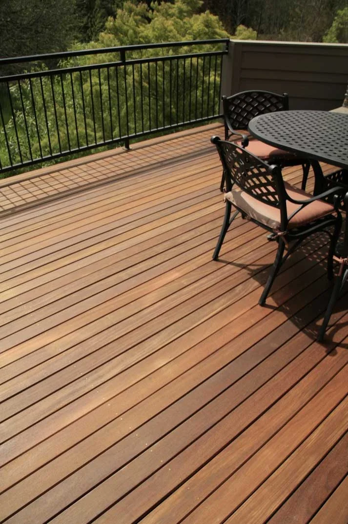 Metal and wood work well together Metal railing, wood deck